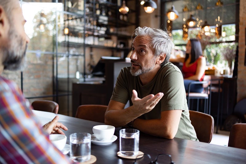 Two friends meeting for a cup of coffee